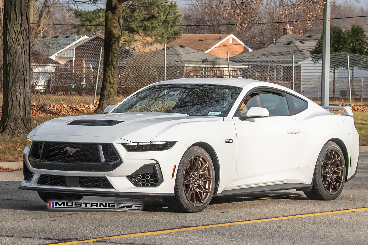 S650 Mustang 2024 Mustang GT (S650) Spied in White with Bronze Appearance Package 1669838733839