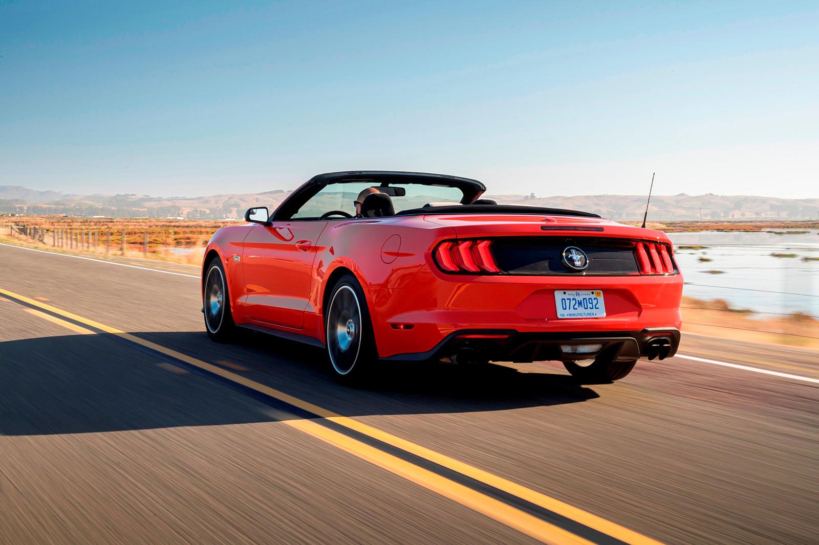 2018-ford-mustang-convertible-rear-view-driving-carbuzz-630767-1600.jpg