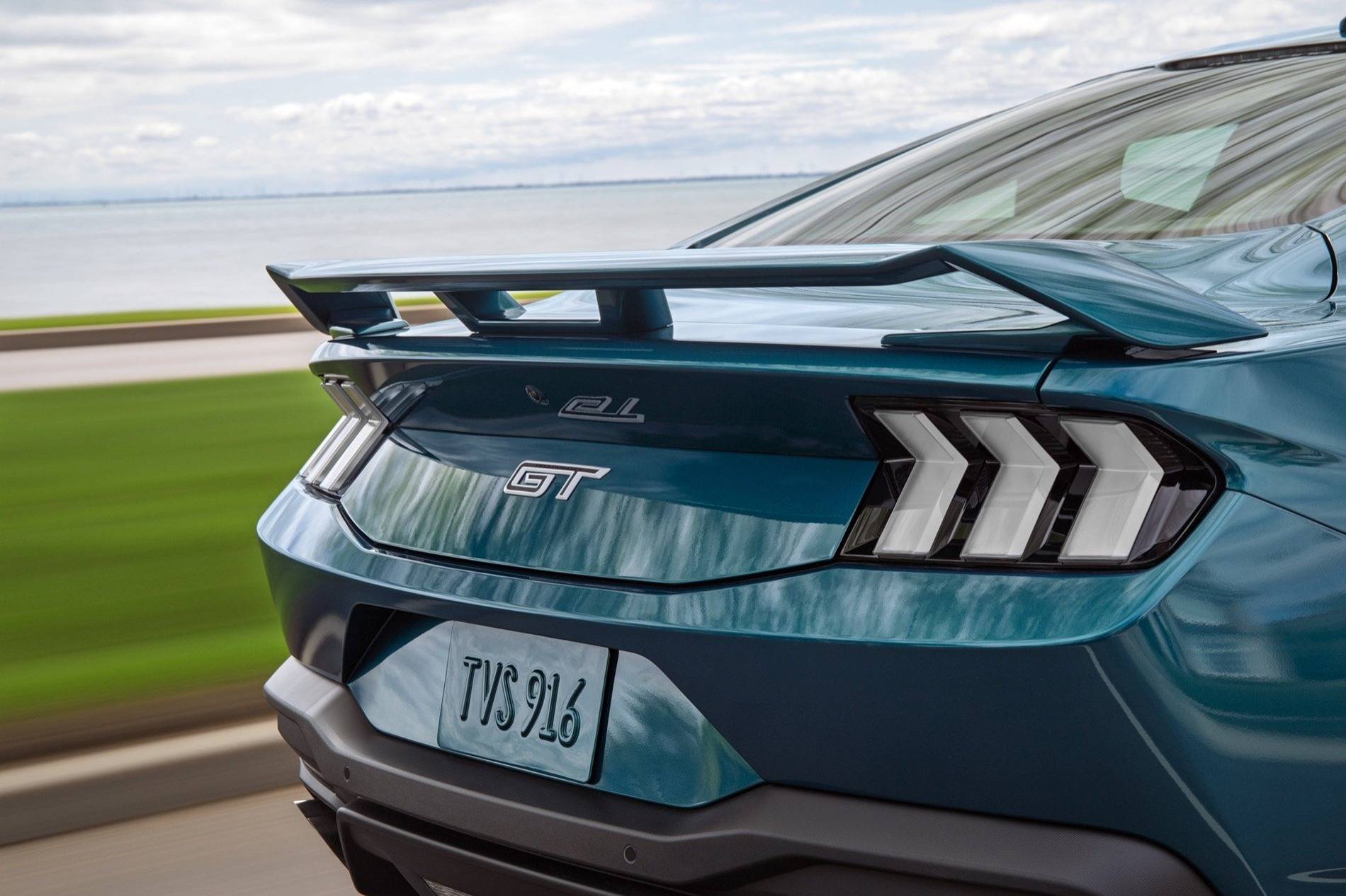 S650 Mustang 2026 FX Package revealed in new Adriatic Blue Metallic color 2026-Ford-Mustang-GT-FX-Package-Reveal-Photos-Exterior-007-spoiler-GT-logo-badge-on-deck-lid