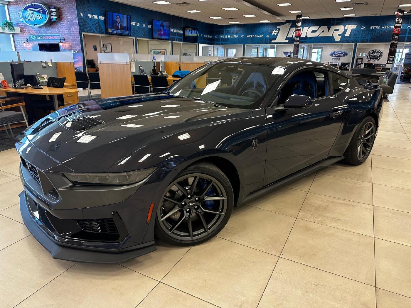 S650 Mustang 2024 Dark Horse on display at dealer "For Sale" (Blue Ember) 32180516967x1400