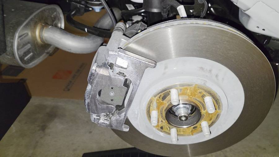 S650 Mustang White stuff/oxidation on brand new car brake caliper? brake oxidation