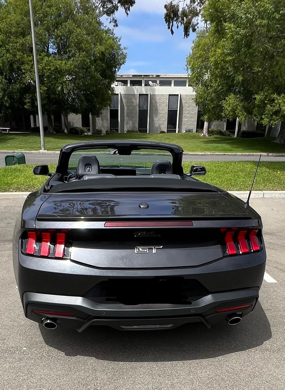 S650 Mustang Bought a new S650 Convertible GT! What are cool exterior mods I can add? Racing stripes? Chin Splitters? Black out wheels? IMG_4228