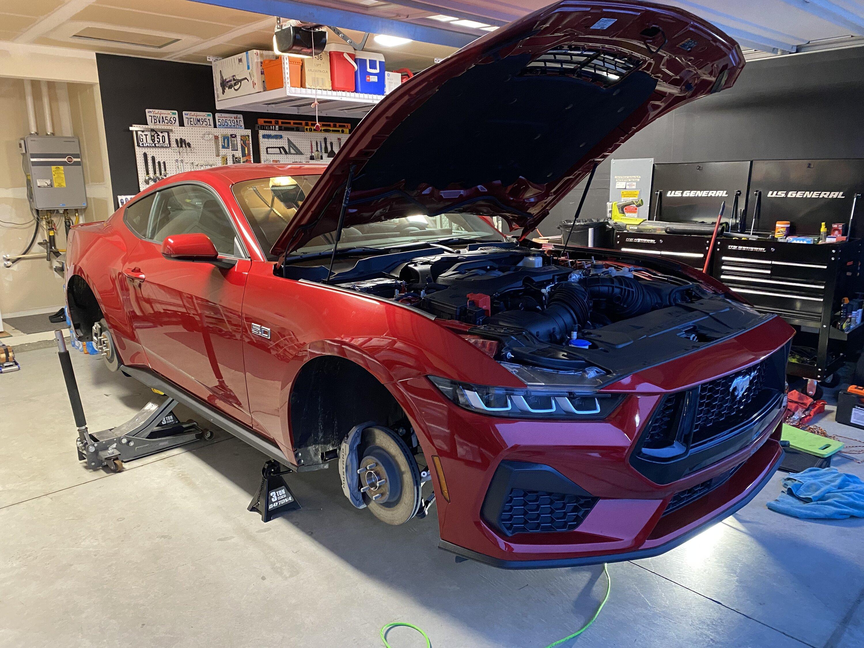S650 Mustang Would I be stupid to pay a shop to install RTR grille and Steeda Springs? IMG_7174