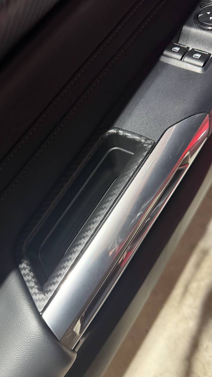 S650 Mustang One of the cheapest, handiest mods you can do in 10 seconds for your interior. Door handle pockets fit and look great! IMG_9861