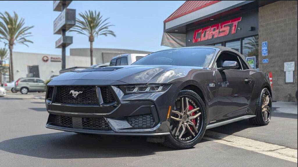 S650 Mustang Bought a new S650 Convertible GT! What are cool exterior mods I can add? Racing stripes? Chin Splitters? Black out wheels? Screenshot 2024-10-05 113051